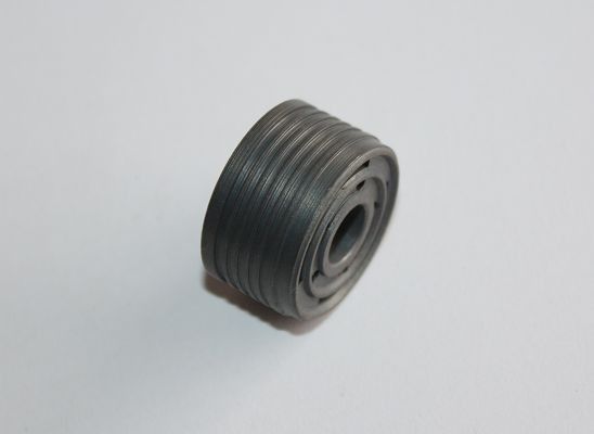 Yoğunluk 6.6g/cm3 Sinter şok Pistonu, otomatik kanal açma makinesi ile üretilmiştir.